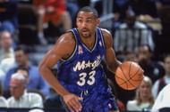 Tracy Mcgrady in the Magic's famous alternate jersey